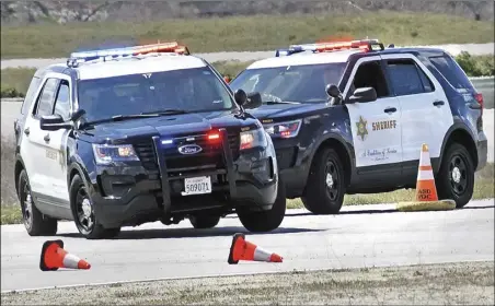  ?? Dan Watson/ The Signal ?? Members of the media drive “Code 3” on the Emergency Vehicle Operations Center training course in Castaic on Wednesday to learn how Los Angeles County sheriff’s deputies handle a pursuit.