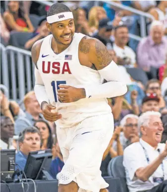  ?? JOSHUA DAHL, USA TODAY SPORTS ?? “I get a chance to go out there, be the leader of the team and enjoy it,” says Carmelo Anthony, a two-time gold medalist.