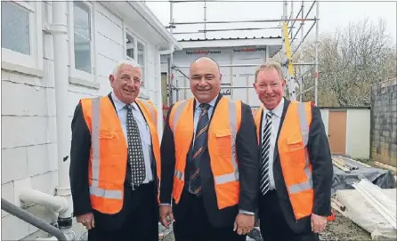  ?? Photo: EMMA WHITTAKER ?? Spreading out: Housing New Zealand capital projects and asset developmen­t group programme manager Rick Kerse, Maungakiek­ie MP Sam Lotu-Iiga, and Minister of Housing Nick Smith get a look at a state house in Mt Roskill being extended as part of Project...