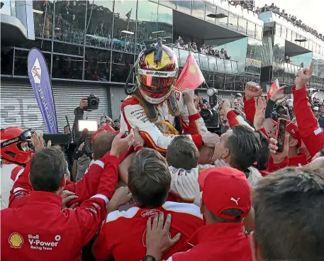  ?? GETTY IMAGES ?? Scott McLaughlin celebrates winning the Bathurst 1000, which is part of the Supercars Championsh­ip at Mount Panorama in Bathurst yesterday.