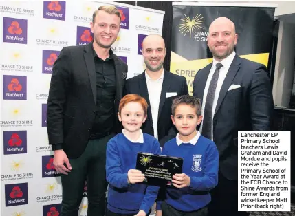  ??  ?? Lanchester EP Primary School teachers Lewis Graham and David Mordue and pupils receive the Primary School of the Year Award at the ECB Chance to Shine Awards from former England wicketkeep­er Matt Prior (back right)