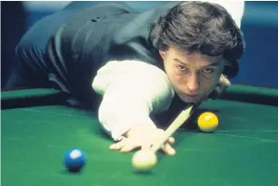  ??  ?? THE WHIRLWIND Jimmy White playing in the World Snooker Championsh­ip in 1987. Picture: Getty