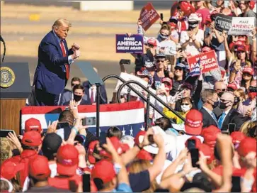  ?? Olivier Touron AFP / Getty I mages ?? PRESIDENT TRUMP addressed a crowd Monday in Prescott, Ariz. He spends long stretches of his rally speeches litigating his grievances against Democrats, the media, water pressure in showers and other issues.
