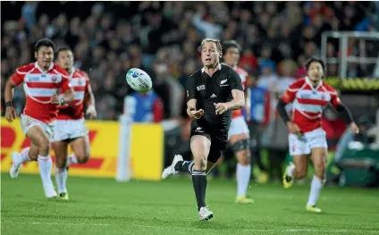  ?? STUFF ?? Andy Ellis makes a break for the All Blacks in a 2011 World Cup match against Japan in Hamilton.