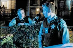  ?? CBS ?? Officers Victoria (Elizabeth Laidlaw), left, and Paul (Noel Fisher) in “The Red Line.”