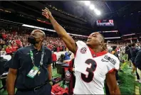  ?? CURTIS COMPTON/ CURTIS.COMPTON @AJC.COM ?? UGA running back Zamir White celebrates after defeating Alabama 33-18 in the CFP title game Monday. White, who will make himself eligible for the NFL draft, rushed for 84 yards on 13 carries and a TD against the Crimson Tide.
