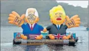  ?? AFP ?? Blimps of US President Joe Biden (left) and UK PM Boris Johnson displayed in Falmouth by activist group Crack the Crisis.