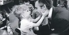  ?? Washington Post ?? Fred Rogers and the unnamed boy in a wheelchair at the Children’s Institute of Pittsburgh in 1978