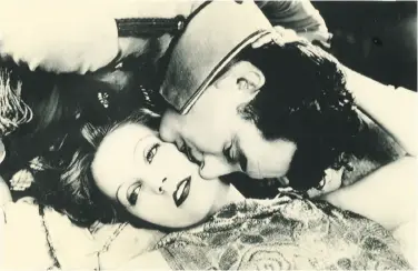  ?? MGM 1926 ?? Greta Garbo, shown with John Gilbert in 1926 during the filming of “Flesh and the Devil,” died in 1990.