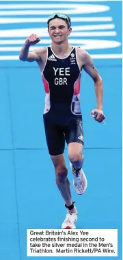  ??  ?? Great Britain’s Alex Yee celebrates finishing second to take the silver medal in the Men’s Triathlon. Martin Rickett/PA Wire.