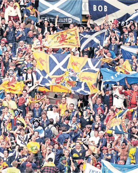  ??  ?? HAMPDEN SPARK: The Tartan Army has suffered 23 years of hurt, so Scotland fans will party like it’s 1998 again.