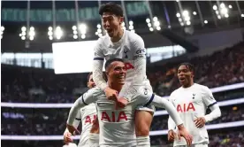  ?? ?? Pedro Porro celebrates with Son Heung-min after scoring Tottenham’s third goal. Photograph: Marc Atkins/Getty Images