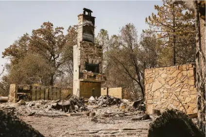  ?? Photos by Brontë Wittpenn / The Chronicle ?? Little of Chuck Carter’s home remains after the Oak Fire swept through the family’s ranch off Carter Road in Mariposa.