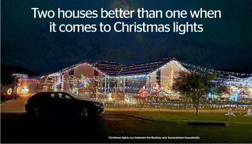  ?? ?? Christmas lights run between the Buckley and Jeevaratna­m households.