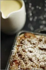  ?? PHIL MANSFIELD/THE CULINARY INSTITUTE OF AMERICA VIA AP ?? This May 12, 2017photo provided by The Culinary Institute of America by shows a peach crumb pie in Hyde Park, N.Y. This dish is from a recipe by the CIA.