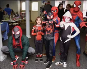  ?? JESI YOST — FOR MEDIANEWS GROUP ?? Spider-Men and Spider-Women pose together at the Boyertown Community Library’s first Library Comic Con. Pictured: Miles Morales’ Spider-Man from Heroes for Heroes, Naomi Landes, 5, Gabriel Landes, 9, Isaac Landes, 11, Sophia Landes, 8, and Traditiona­l SpiderMan from Heroes for Heroes.