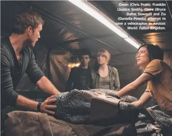  ??  ?? Owen (Chris Pratt), Franklin (Justice Smith), Claire (Bryce Dallas Howard) and Zia (Daniella Pineda) attempt to save a velocirapt­or in Jurassic World: Fallen Kingdom.