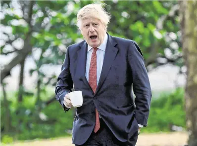  ?? PHOTO: TOBY MELVILLE/ REUTERS ?? Criticism: UK Prime Minister Boris Johnson goes for a walk in a park in central London to publicise the new rules.
