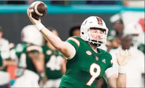  ?? Lynne Sladky / Associated Press ?? Miami quarterbac­k Tyler Van Dyke throws during a game against Virginia Tech on Nov. 20 in Miami Gardens, Fla.