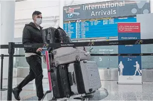  ?? FRANK GUNN THE CANADIAN PRESS ?? Calls are mounting for Ottawa to limit travel from India and other such hot spots. India recorded nearly 300,000 new cases of COVID-19 on Wednesday alone.