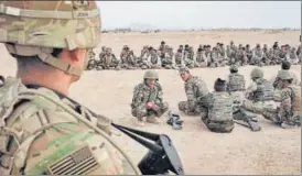  ?? NYT ?? File photo of US Army soldiers overseeing Afghan National Army trainees at Camp Bastion in Afghanista­n’s Helmand Province.