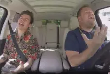  ?? YOUTUBE ?? Harry Styles and James Corden get way into performing Styles hit song “Sign of the Times” together on “Carpool Karaoke.”