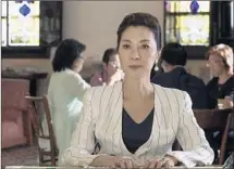  ??  ?? MICHELLE YEOH makes an understate­d yet unmistakab­ly high-end statement as intimidati­ng matriarch Eleanor Young.