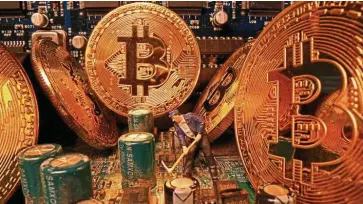  ?? Reuters ?? Back in demand: Believers say the gains are driven by bitcoin’s upcoming halving, when the rewards miners receive for processing transactio­ns will be cut in half as soon as May 12. —