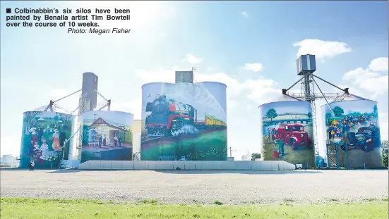  ?? Photo: Megan Fisher ?? ■ Colbinabbi­n’s six silos have been painted by Benalla artist Tim Bowtell over the course of 10 weeks.