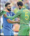  ?? GETTY IMAGES ?? Mohd Amir (right) greets Virat Kohli.