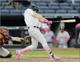  ?? SETH WENIG — THE ASSOCIATED PRESS ?? New York Yankees’ Chase Headley hits a three-run home run during the seventh inning of a baseball game against the Houston Astros, Sunday in New York.