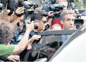  ??  ?? Invaluable witness: Michael Cohen leaves court after pleading guilty to eight counts relating to unpaid tax and campaign finances