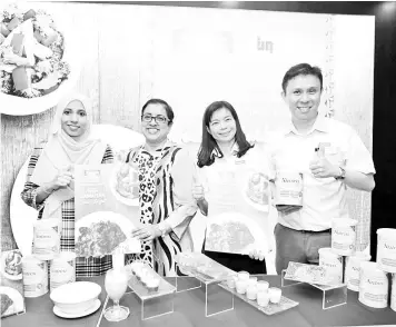  ??  ?? Emily (second right), Mary (second left) and Siti Farhath (left) during the launch of the booklet, titled Nutren Untuk Diabetik Diabetes Management Guide & Simply Delicious Ramadan Recipes at Institut Jantung Negara.