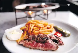  ?? ALLEN McINNIS ?? Francophil­e moms shouldn’t miss this classic at Café Cherrier: “le fameux rumsteak du Cherrier.”