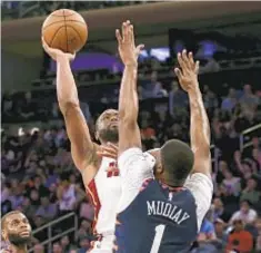  ?? AP ?? Dwyane Wade scores 16 points in his final game at Madison Square Garden before his retirement after the season.