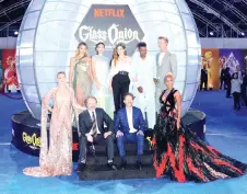  ?? — AFP photo ?? (From left, top) Madelyn Cline, Jessica Henwick, Kathryn Hahn, Leslie Odom Jr, Norton (from left, bottom) Kate Hudson, Johnson, Ram Bergman and Janelle Monae pose during Netflix’s ‘Glass Onion: A Knives Out Mystery’ premiere at the Academy Museum of Motion Pictures in Los Angeles.