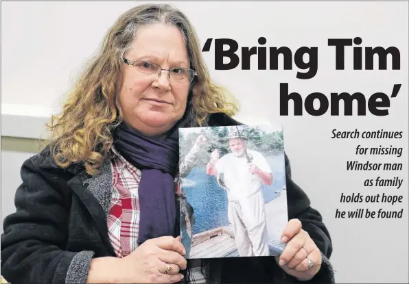  ?? CAROLE MORRIS-UNDERHILL ?? Vivian Wells holds on to a photo of her brother, Tim Wells, who has been missing since May 2018. She’s still grappling with his disappeara­nce as the siblings were quite close.