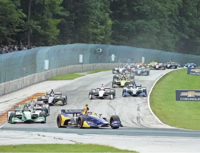  ?? JAMES J. BLACK / INDYCAR ?? Alexander Rossi won the REV Group Grand Prix NTT IndyCar Series race at Road America in Elkhart Lake last season. This weekend, the racing schedule is a bit busier.