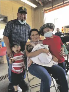  ?? PHOTO ELIZABETH MAYORAL CORPUS ?? The Martinez family, with their sons. One of them, Daniel, is a burn survivor and assisted the Mother’s Day Meet Up at Fire Station No. 3 in El Centro on Saturday.
