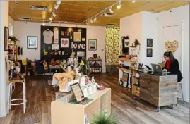  ?? Lake Fong/Post-Gazette ?? Collective-style stores like love, Pittsburgh on Mount Washington stock a variety of brands by makers from across the region.