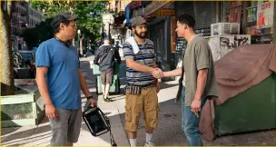  ??  ?? CHU’S THE ONE
Director John M. Chu with Miranda and Ramos on location (right).
