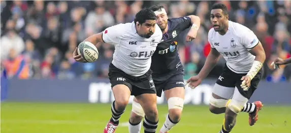  ??  ?? Fiji Airways Flying Fijians prop Campese Ma’afu on attack supported by Viliame Mata against Scotland at Murrayfiel­d on November 11, 2018.Photo: Ian Muir