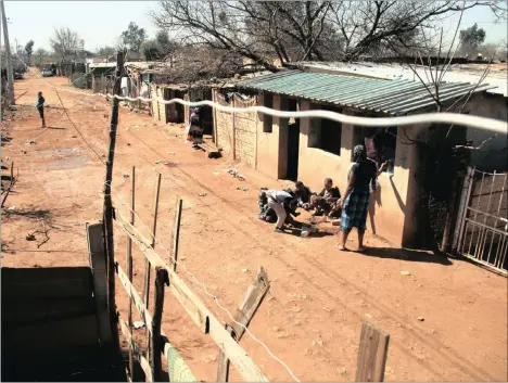  ??  ?? The community of the Thembelihl­e Informal Settlement have been in a battle to be allowed to stay on their land in Lenasia more than 15 years. Their current, burning issue is the electrific­ation process that’s being facilitate­d by the City of Joburg....