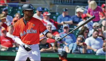  ?? DAVID SANTIAGO ?? Marlins outfielder Lewis Brinson showed Stanton-like power in his first at-bat Tuesday.