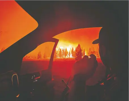  ?? B.C. WILDFIRE SERVICE ?? British Columbia entered a provincial state of emergency on Wednesday in preparatio­n for more potential mass evacuation­s as wildfires continue to threaten communitie­s. The government says 40 evacuation orders are already in place, affecting 5,700 people.