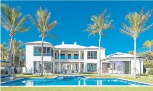  ??  ?? The two-story Ocean Ridge estate appears in country music singer Jenny Tolman’s video for “Something to Complain About.”