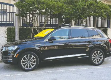  ?? BARNACLE PARKING / HO / THE CANADIAN PRESS ?? The Barnacle is a bright yellow device placed on a vehicle's windshield and secured by suction cups that latch onto the glass with 450 kilograms of force. If someone tampers with the device, it triggers an alarm.