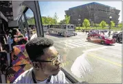  ?? JARRAD HENDERSON, USA TODAY STAFF ?? Stax Music Academy student Christophe­r Franklin, 16, looks toward the Washington Monument while on his way to perform at the Freedom Sounds festival.