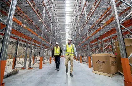  ?? WARWICK SMITH/STUFF ?? Countdown national property manager Bruce Waite, left, and project manager Mark Pearson inspect the vast interior of the new distributi­on centre on Alderson Drive.