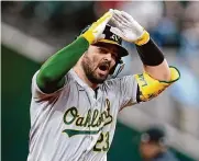  ?? Tony Gutierrez/associated Press ?? Athletics catcher Shea Langeliers hit three homers on Tuesday, including two off of Rangers relievers.